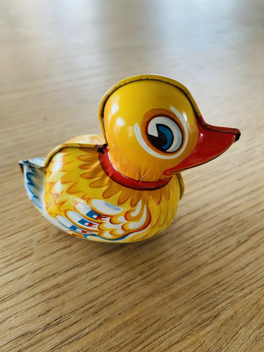   Vintage Blechspielzeug – gelbe Ente 