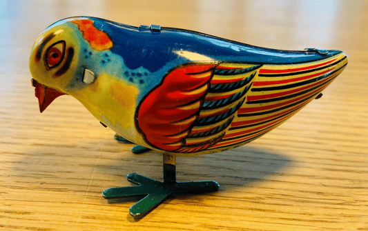   Vintage Blechspielzeug – pickender Vogel 